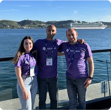 Colaboradores do WebWork participando de uma conferência